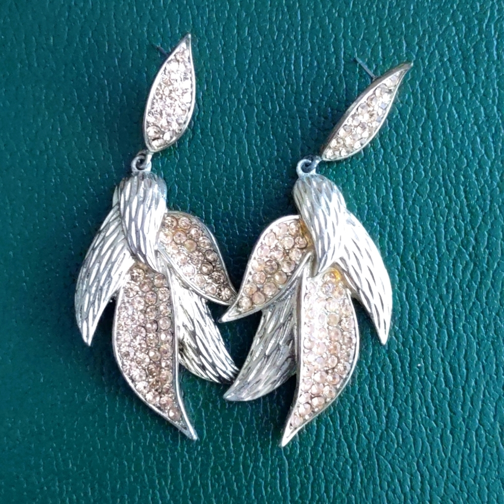 Gold earrings ...